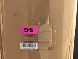 a box with a pink sticker on it sitting on a table