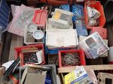 many boxes of assorted items sitting on the floor