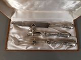 a box with a set of silverware in it