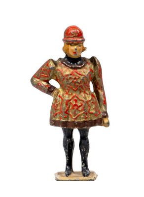 figurine of a woman in a red and gold dress and hat