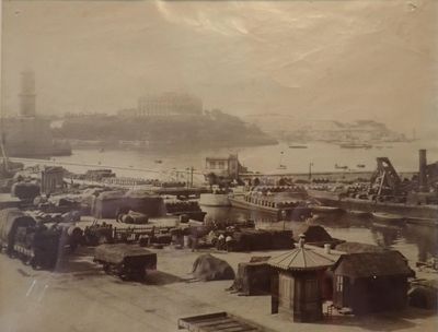 a black and white photo of an old photo of a harbor