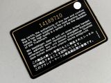 a picture of a black and white label on a white surface