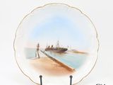 a plate with a picture of a ship on it