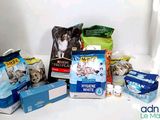 many different types of cat food on the counter
