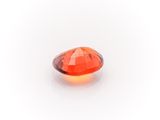 an orange topazte gems on a white background
