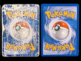 four different types of pokemon toys in plastic packaging on a black background