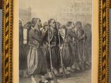 an old picture of a group of men standing next to each other