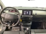 the interior of a car with a steering wheel, dashboard, and dash board