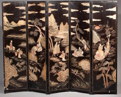 an image of a black and gold screen with birds and clouds on it