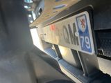 a close up of a license plate on a truck