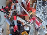 a pile of assorted tools sitting on top of a table