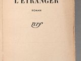 an open book with a picture of a man on the cover