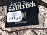 jean paul gautik ' s shirt with a label on it