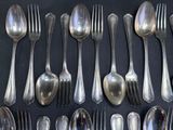 a lot of spoons and spoon spoons on the table