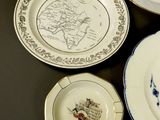 three plates and a cup on the table