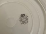 a white plate with a black and white design on it