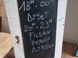 a chalk board that has been placed on the floor