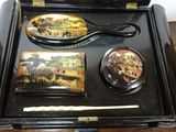 a black case with pictures of animals on it on a table