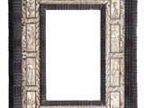 a black and white picture frame with a pattern on it
