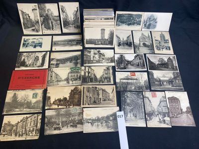 several old postcards of old buildings and buildings on a table