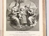 an open book with a picture of a woman and a child on it