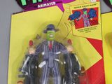 two action figures of a man in a suit and hat