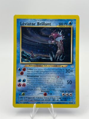 a close up of a pokemon card on a white surface