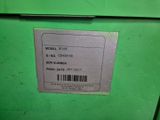 a label on the side of a green box