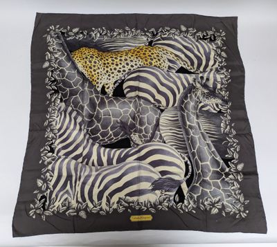 zebras, giraffes, and leopards on a black and white scarf