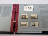 an open book with pictures on it on a table