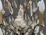 an image of a chandelier made of glass and metal