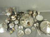 a lot of silver items that are on a table
