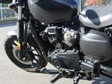 a motorcycle that is parked on the side of the street