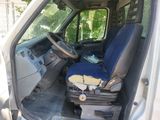 an image of the inside of a van with the seat up