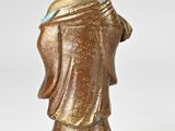 an image of a statue of a woman with a hat on her head