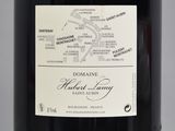 a bottle of wine that has a map on it