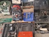 a lot of tools that are sitting on the ground