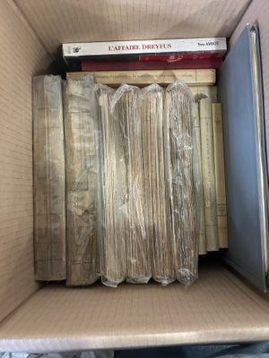 a box full of books that are sitting on a table