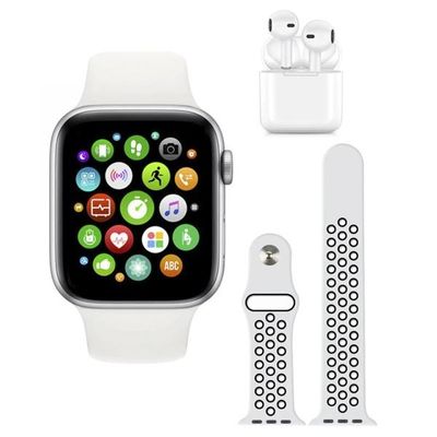 une Apple Watch, avec des AirPods et un chargeur à côté