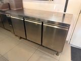 a stainless steel counter top in a commercial kitchen