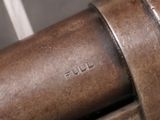 a close up of a piece of metal that is on top of a table