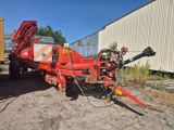 une image représentant un tracteur attelé à une remorque