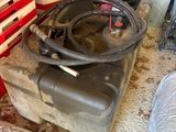 a trash can and other items in a room