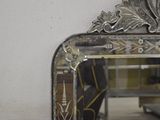 a mirror that is hanging on the wall in the room