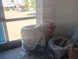 a room with a lot of stuff on the floor and a window
