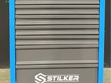 an image of a blue tool cabinet with a sticker on it