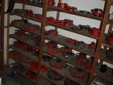 a room with a bunch of tools on the shelves