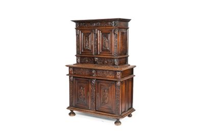 an image of a wooden cabinet with carvings on it