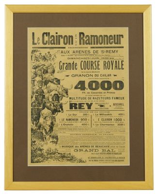 une affiche encadrée représentant un homme à cheval dans un champ