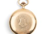 an image of a gold pocket watch on a white background
